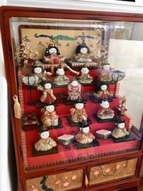 unique display cabinet of small Japanese Hakata dolls