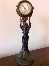 Antique figural clock