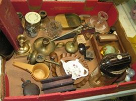 assorted old items including a jar of marbles