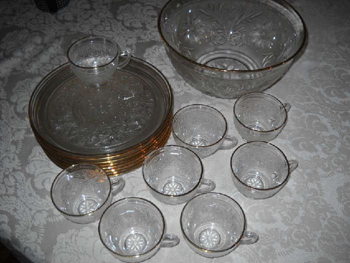 Brass-rimmed punchbowl set with 8 plates and cups