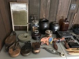 Antique pulleys; butter churn; nice variety of antiques.