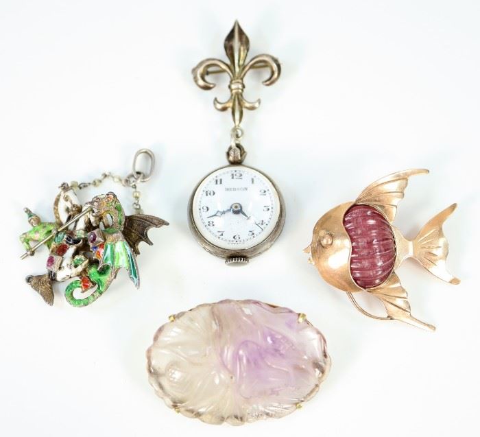 Four Pieces of Ladies Jewelry - Including 1 14 kt yellow gold and rubellite tourmaline fish brooch, 1 14 kt yellow gold carved amethyst brooch, 1 Austro-Hungarian enameled and paste articulated pendant of George and the Dragon, and 1 Ladies Hudson Pendant watch with Sterling fleur-de-lis pin.  All are marked.  Wear to each, the articulated pendant is missing a portion of the chain, carved amethyst with some flakes.  Up to 2 1/2" long overall.  Totaling 50.1 grams.