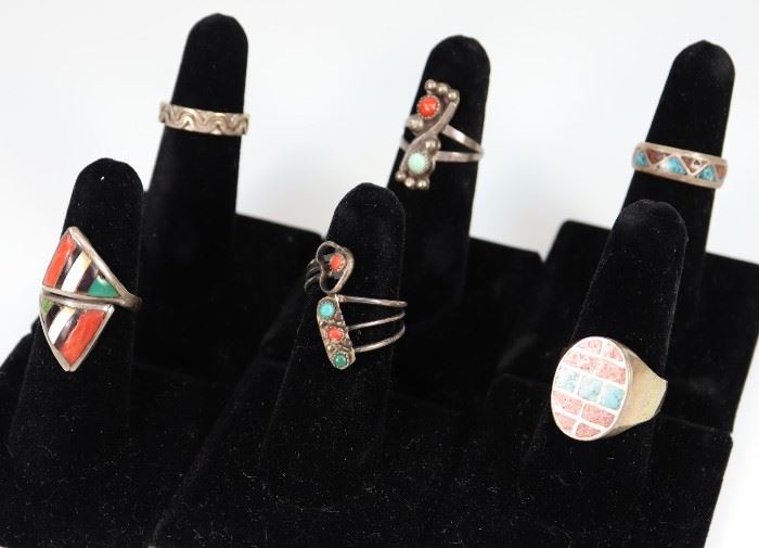 Six Silver, Turquoise, Onyx, Mother of Pearl, and Coral Rings - Only one is marked "Sterling 925". One band ring is misshapen, minor wear overall. 