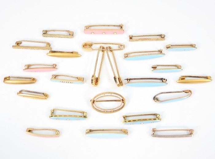 A Group of Twenty-Four Bar Pins -  Including 11 14 kt yellow gold and enamel bar pins, four with Krementz "collar bar" mark, 7 14 kt yellow gold pins, 4 10 kt gold bar pins, and 2 unmarked pins.  Light wear to each.  Up to 1" long.  Marked pieces (22 in all) total 20.5 grams.  