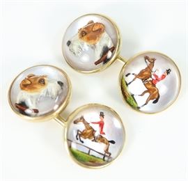 A Pair of 14 kt Gold & Reverse Intaglio Crystal Cufflinks by Abercrombie & Fitch -  Circular shape, centered by a rock crystal cabochon carved and painted to depict equestrian scenes consisting of a terrier and a horse with rider. Both are stamped "14 k AF" and engraved "Jean, 5.31.37". Very minor wear. Diameter of each approximately 0.5". Totaling 10.9 grams
