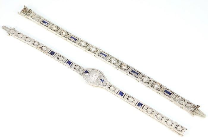 Two Art Deco Era White Gold, Sapphire & Diamond Bracelets - Each link style bracelet with filigree design contains sapphire and diamond enhancements. Both stamped "14 k". Minor wear overall. Both up to 6.75" long. Totaling 29.1 grams.
