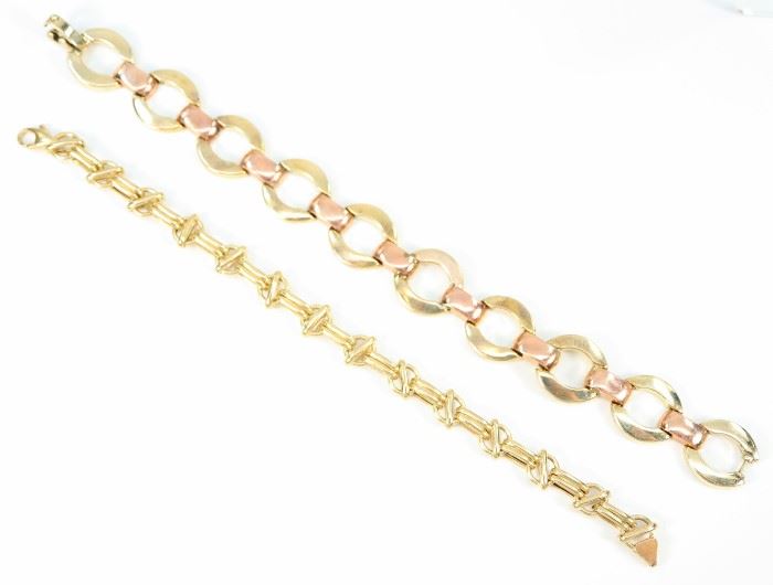 Two 14 Kt Gold Bracelets -  Including 1 yellow gold bracelet stamped "14K Italy" and 1 yellow and rose gold bracelet stamped "14K".  Minor wear to each.  Up to 7 1/4" long.  Totaling 21.0 grams.  