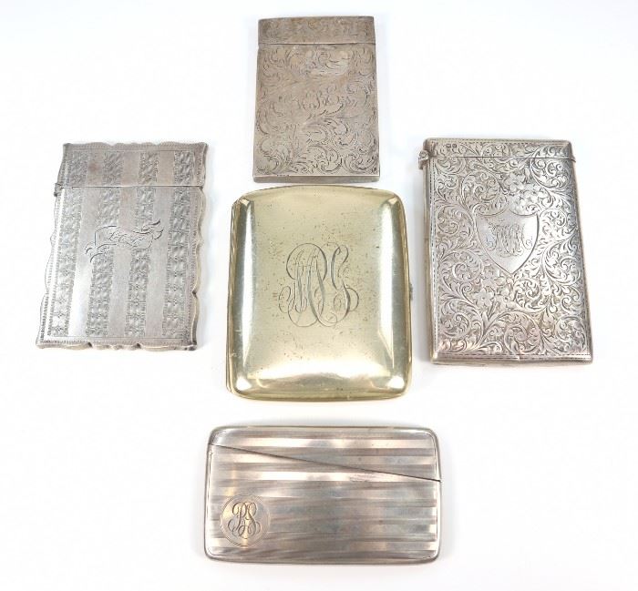 Four 19th Century Silver Card Cases &  One Cigarette Case -  Including  4 silver card cases, one by Watrous Mfg. Co. and one with marks by William Neale (Chester, date mark indicating 1902), two are unmarked, together with 1 Gorham sterling cigarette case.  All pieces are monogrammed.  Light wear and scratches to each, two card cases with indentations at the corners and indentation noted to the cigarette case.  Up to 2 1/2" x 3 3/4" high.  Totaling approximately 9.07 oz.  