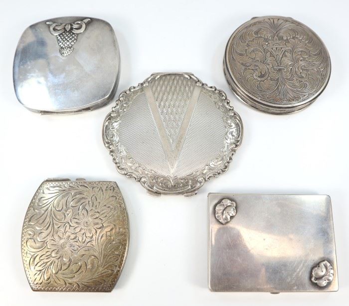 Three American & Two Continental Silver Compacts -  American sterling compacts include 1 by The Thomae Co., 1 by Birks, and 1 By R. Blackington & Co., each is marked accordingly with maker's mark and "Sterling"; together with 1 Czechoslovakian silver compact stamped "835" along with the mark used c. 1929-1942 and "PA" enclosed within a rectangle, and 1 other compact, possibly German, stamped with worn markings and "800".  Two are monogrammed.  All show some wear, light scratches.  Up to 3 1/2" x 3 1/4".  
