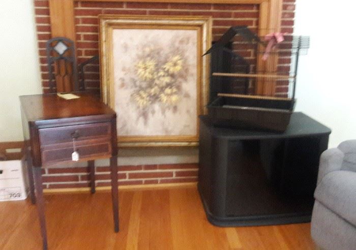 end table sold
oil painting, bird cage, TV
Cabinet