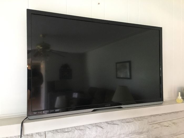 42 inch Visio tv with table stand and wall mount