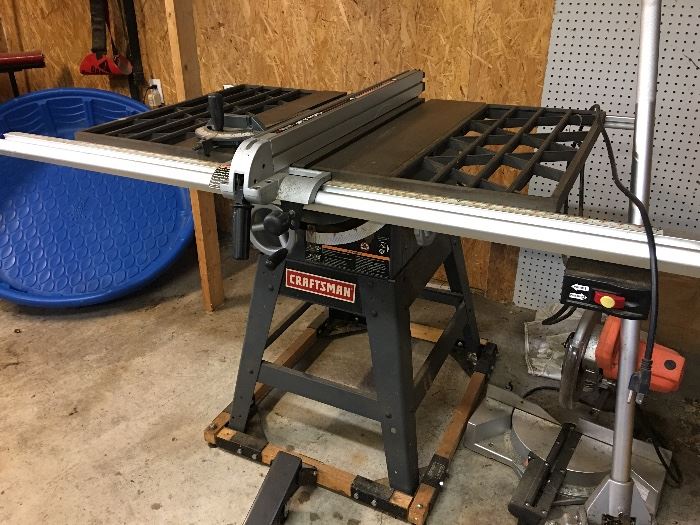 Craftsman 10” table saw on casters. Very nice.
