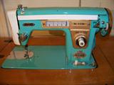Turquoise Vintage De Luxe Sewng Machine with Cabinet, Made in Japan with Good Housekeeping Seal of Approval