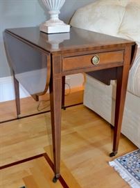 One of a pair of Baker Furniture Pembroke tables