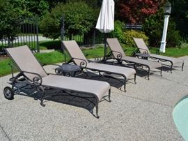 Set of four Cast Classics lounge chairs (Umbrella not for sale)