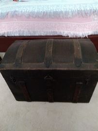 Metal and wood antique steamer trunk with dome lid $200.