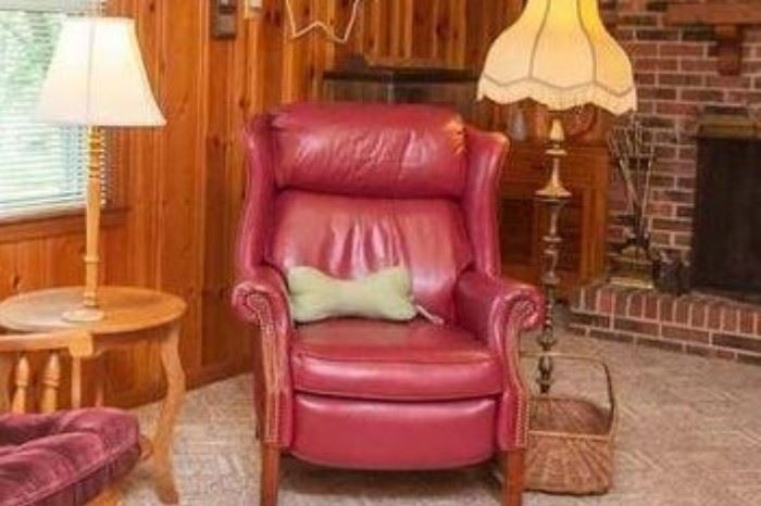 Burgundy leather chair with nailhead trim$200