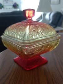 Two toned red and marigold carnival glass candy dish $50.