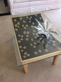 Hand painted leather bench repurposed with bevel cut glass to become one of a kind coffee table. Gorgeous!