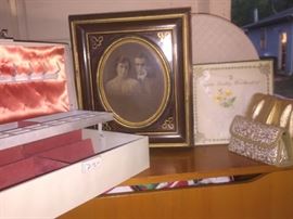 Vintage jewelry box, old photos some in frames, vintage purses & hankies still in original packing