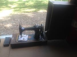 Antique sewing machine in case with original paperwork 