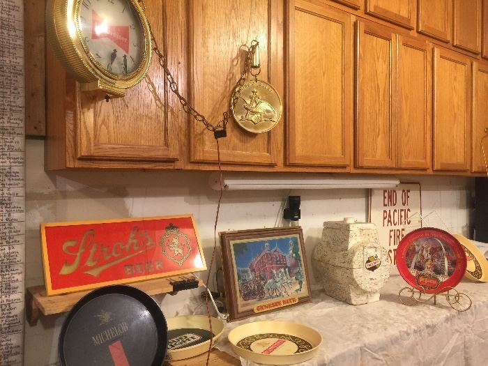 Budweiser clock motion pocket watch lighted, Strohs Beer light, Genesee Firefighter lighted Beer Sign, Beer trays and One with St. Louis and the arch pretty neat, Falstaff Insulated Beer Keg Dispenser