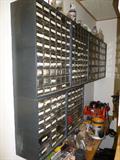 100's of drawers of misc wood working screws, dowels, etc.