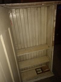 Here's the inside of a great cabinet.  Love the bead board back!