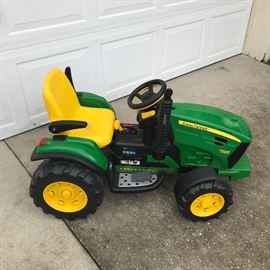 Kid's rechargeable powered John Deere "riding mower".