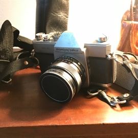 Vintage camera with multiple lenses.