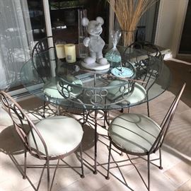 Iron "Mickey" Table and chair set. The iron is a bit rusty, but can easily be refinished.