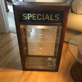 Custom cabinet made with vintage door. The cabinet is it and has 4 adjustable glass shelves.