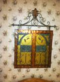 Decorative gate over bed will also look great in a dining room, hallway or family room.