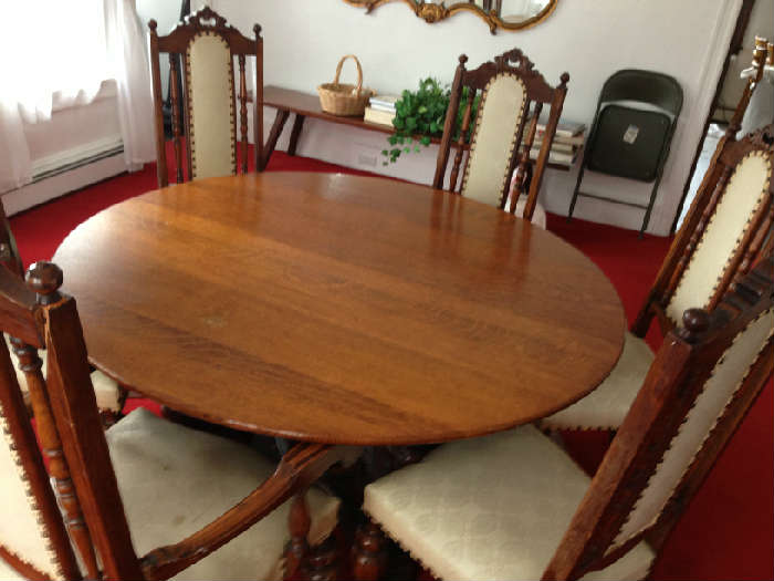 Set by Horner includes the table, chairs and china hutch.