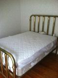 The second brass bed is antique and full size as well.