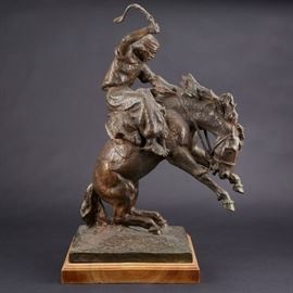 Lot #20 Jose Belloni (1882-1965). Bronze sculpture titled Jineteando of a man riding a bucking horse. Sculpture is signed along the base. 
Provenance: Distinguished corporate collection, Minnesota.
Dimensions: Height: 26 in x width: 18 in x depth: 13 1/2 in.