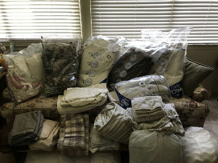 Quilts, sheets, sofa