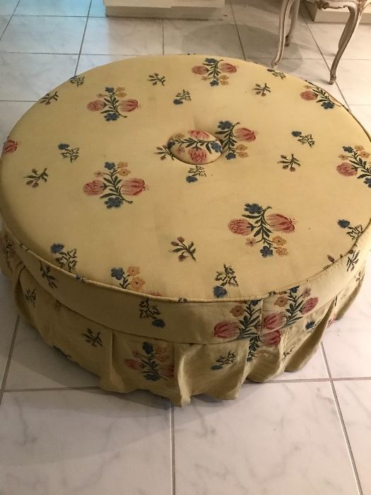 Tufted, skirted large scale round ottoman. 