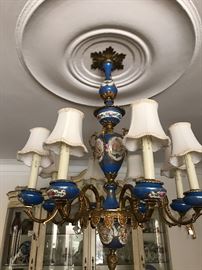Sevres style eight arm celeste blue chandelier with floral and pastoral handpainted scenes. 
