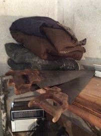 Tarps, saws, wood to pick from