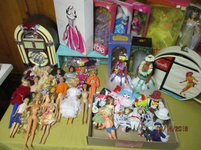 some of the vintage Barbie and a case of clothes