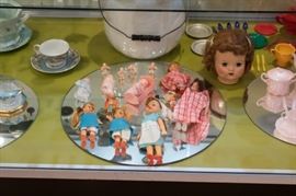 vintage dolls and children's dishes...