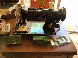 Singer sewing machine with cabinet 