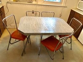 Retro kitchen table and 5 orange chairs
