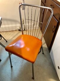 1 of 5 orange chairs