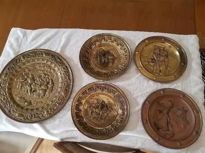 Brass decorative wall plates.
