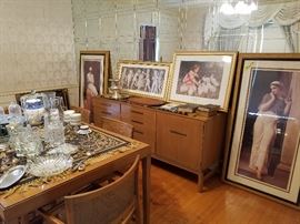Beautifully framed pictures and glassware.