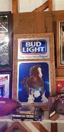 Collection of beer mirrors and signs
