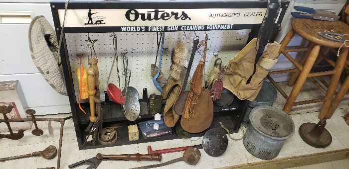 Vintage hunting and fishing items and Outers display