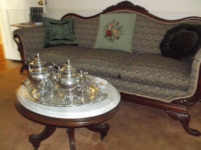Swan neck sofa and marble coffee table w/silverplate tea set